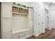 Mud room featuring storage, a bench with seat, and coat hooks at 3559 Maple Bay Ln, Land O Lakes, FL 34638