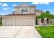 Inviting two-story home features a three-car garage and neatly maintained landscaping at 3633 Morgans Bluff Ct, Land O Lakes, FL 34639