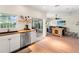 Spacious kitchen showcasing stainless steel appliances and a seamless transition to the living area for easy entertaining at 3633 Morgans Bluff Ct, Land O Lakes, FL 34639