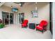 A covered, screened-in outdoor patio with views of the backyard and a sliding glass door at 3633 Morgans Bluff Ct, Land O Lakes, FL 34639