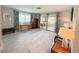 Relaxing bedroom featuring a large window, neutral colors, and ample space at 3854 Trophy Blvd, New Port Richey, FL 34655
