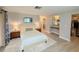 Comfortable main bedroom with ensuite bathroom and a spacious walk-in closet at 3854 Trophy Blvd, New Port Richey, FL 34655