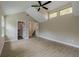 Bright bedroom features vaulted ceilings, wood floors, and multiple windows allowing for an abundance of natural light at 4044 Red Fox Ct, Wesley Chapel, FL 33543