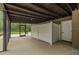 Inviting screened-in patio with convenient outdoor shower area and access to the backyard at 4044 Red Fox Ct, Wesley Chapel, FL 33543