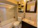 Traditional bathroom featuring a vanity and a shower with sliding glass doors at 4214 Trucious Pl # 4212, New Port Richey, FL 34652