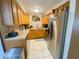 Functional kitchen featuring stainless steel appliances and ample cabinet space at 4214 Trucious Pl # 4212, New Port Richey, FL 34652