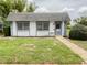 Clean and well-maintained exterior view of the community laundry building with tidy landscaping at 4214 Trucious Pl # 4212, New Port Richey, FL 34652
