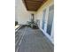 Covered back patio with seating at 4304 Harbor House Dr, Tampa, FL 33615