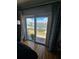 Bedroom view of the private balcony with a tranquil canal view in the background at 4304 Harbor House Dr, Tampa, FL 33615