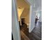 Cozy bathroom features a unique under-stairs space, toilet, and wood-look flooring at 4304 Harbor House Dr, Tampa, FL 33615