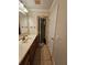 Bathroom featuring a vanity with a sink and a glass-door shower at 4304 Harbor House Dr, Tampa, FL 33615