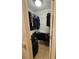 Organized walk-in closet with hanging clothes, shelves, and space for shoes and bags, optimizing storage in a compact area at 4304 Harbor House Dr, Tampa, FL 33615