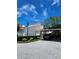 Exterior view of the building and assigned covered parking at 4304 Harbor House Dr, Tampa, FL 33615