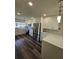 Modern kitchen boasts sleek white cabinets, stainless steel appliances, and stylish countertops, creating a pristine cooking space at 4304 Harbor House Dr, Tampa, FL 33615