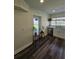 Bright kitchen featuring white cabinets, stainless steel appliances, and a window overlooking the water, plus a cozy breakfast nook at 4304 Harbor House Dr, Tampa, FL 33615