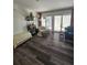 The living room has a modern design with sleek flooring, ample light, and a cozy seating arrangement at 4304 Harbor House Dr, Tampa, FL 33615
