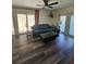Comfortable living room area features hardwood flooring, natural light, and a cozy sofa at 4304 Harbor House Dr, Tampa, FL 33615