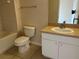 Bathroom with a vanity, toilet, and bathtub with tile flooring at 4305 Bayside Village Dr # 301, Tampa, FL 33615