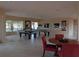 Spacious game room with pool tables and a round table with comfortable seating at 4305 Bayside Village Dr # 301, Tampa, FL 33615