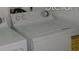 Laundry appliances in a well lit laundry room at 4305 Bayside Village Dr # 301, Tampa, FL 33615