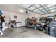 Spacious garage with ample storage, workshop area, and organization, catering to various hobbies and needs at 5006 Jackel Chase Dr, Wimauma, FL 33598
