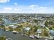Stunning aerial view showcases the waterfront community and canal-front homes at 5070 Cedarbrook Ln, Hernando Beach, FL 34607