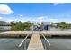 Private dock with boat lift offers direct water access at 5070 Cedarbrook Ln, Hernando Beach, FL 34607