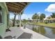 Peaceful patio with canal view, perfect for relaxing outdoors at 5070 Cedarbrook Ln, Hernando Beach, FL 34607