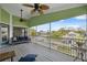 A comfortable screened in porch offering a panoramic view of the canal at 5070 Cedarbrook Ln, Hernando Beach, FL 34607