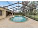 A view of the screened-in pool, offering a private and refreshing outdoor oasis at 5078 Florentine Ct, Spring Hill, FL 34608