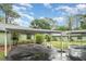 View of the carport, providing covered parking spaces in front of the single-story residences at 5084 Barrington Cir # 3202, Sarasota, FL 34234