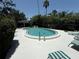 Community swimming pool with sun loungers and a spacious sun deck at 5084 Barrington Cir # 3202, Sarasota, FL 34234