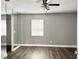 Bedroom with neutral walls, modern flooring, window, and closet with mirror doors at 5229 Tennis Court Circle, Tampa, FL 33617