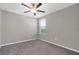 Bedroom featuring neutral walls, carpet flooring, and a window for natural light at 5432 Rainwood Meadows Dr, Apollo Beach, FL 33572