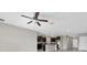 Open-concept living space with kitchen featuring dark wood cabinets, granite countertops, stainless steel appliances at 5432 Rainwood Meadows Dr, Apollo Beach, FL 33572