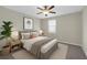 Calm and inviting main bedroom with soft lighting, neutral tones, and comfortable furnishings at 5432 Rainwood Meadows Dr, Apollo Beach, FL 33572