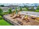Community playground with climbing structures, slides, and benches, creating a fun space for children at 5432 Rainwood Meadows Dr, Apollo Beach, FL 33572