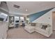 Second floor bonus room with work station and large comfortable couch at 5511 Del Coronado Dr, Apollo Beach, FL 33572