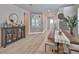 Dining area features a console table with decor and a staircase with a decorative gallery wall at 5511 Del Coronado Dr, Apollo Beach, FL 33572