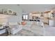 The living room features an open concept with an eat-in kitchen and comfortable white sectional seating at 5511 Del Coronado Dr, Apollo Beach, FL 33572