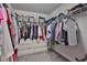 Organized walk-in closet featuring ample shelving and hanging space at 5511 Del Coronado Dr, Apollo Beach, FL 33572