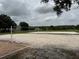Bright community volleyball court with white sand and net ready for fun at 5519 Reflections Blvd, Lutz, FL 33558