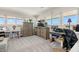 Bonus room with carpeted floors features lots of natural light and nice lighting fixtures at 5782 Westshore Dr, New Port Richey, FL 34652