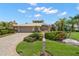Beautifully landscaped front yard leads to this charming home with a circular driveway at 5782 Westshore Dr, New Port Richey, FL 34652