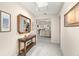 Elegant foyer with mosaic tile flooring and stylish decor at 5782 Westshore Dr, New Port Richey, FL 34652