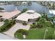 Well maintained single-Gathering home featuring mature landscaping and a paver driveway with two-car garage at 5782 Westshore Dr, New Port Richey, FL 34652