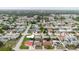 Wide aerial shot displaying the property's location in a residential community at 5840 Liddell Dr, New Port Richey, FL 34652