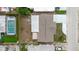 Aerial view of house with enclosed pool, patio, and fenced yard in a residential neighborhood at 5840 Liddell Dr, New Port Richey, FL 34652