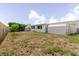 Fenced backyard provides outdoor dining space at 5840 Liddell Dr, New Port Richey, FL 34652