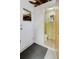 Small half-bathroom featuring a toilet and minimal storage at 5840 Liddell Dr, New Port Richey, FL 34652